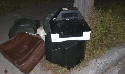 End-of-life televisions thrown out on street curb